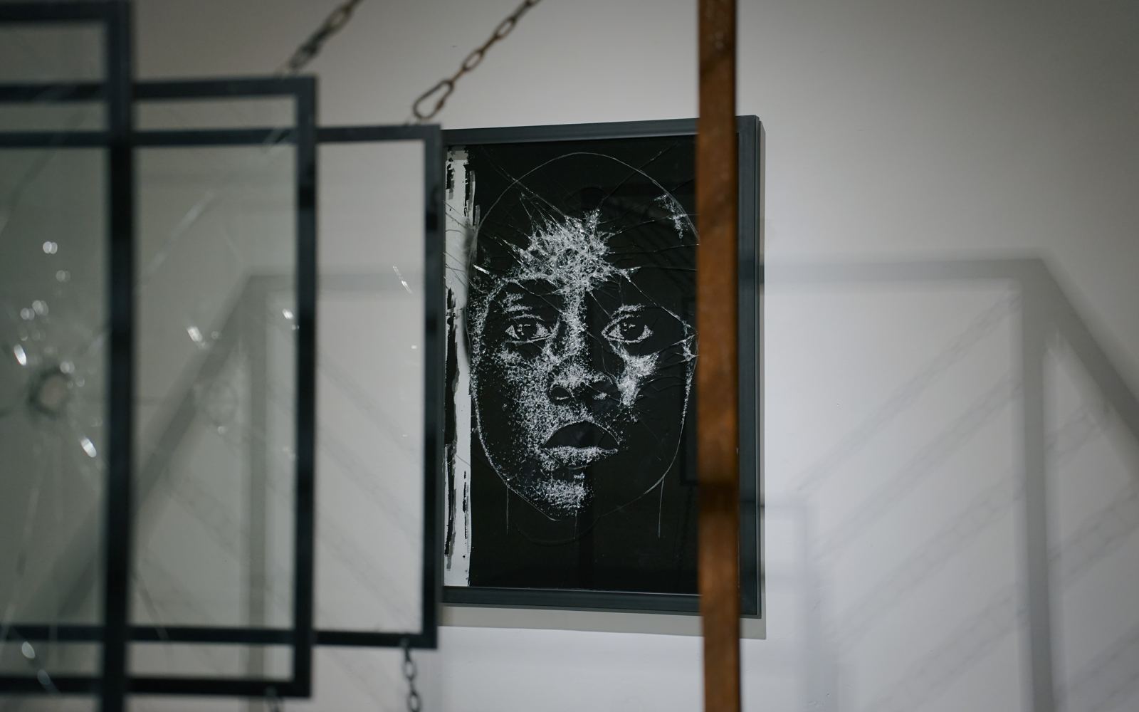 Gallery installation with rock pile